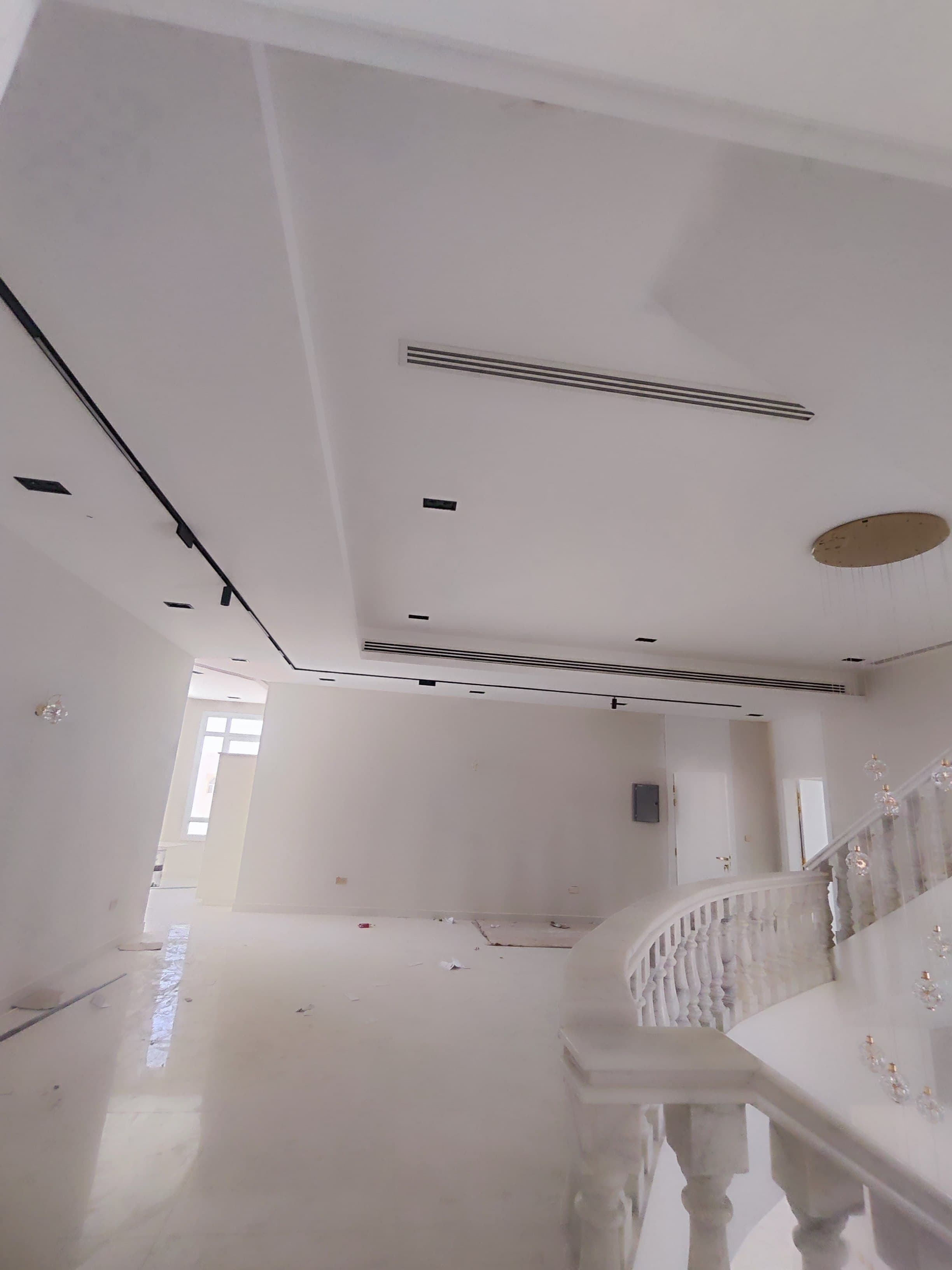 Gypsum board false ceiling with cove lighting in a Doha villa (view 3)